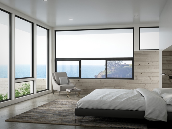 Modern bedroom with wide glass windows shows why chip repair matters, replacement windows Santa Barbara, CA