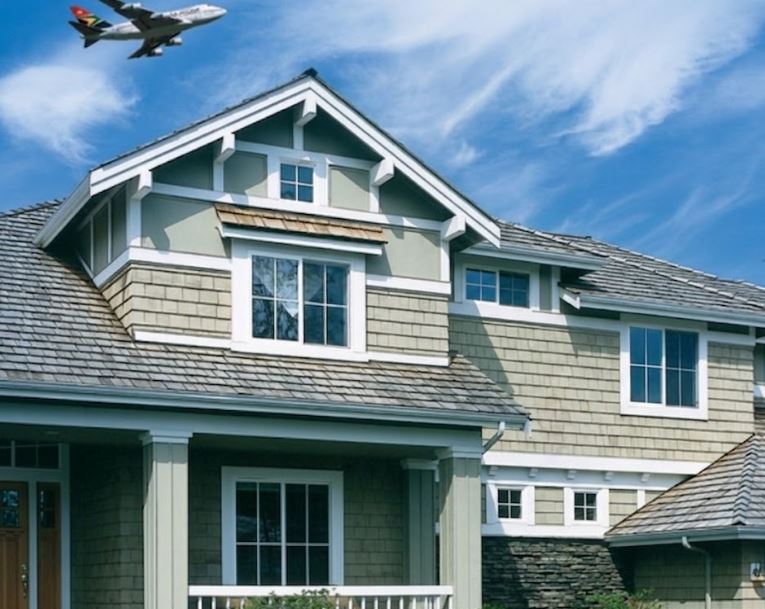 Soundproof replacement windows in Santa Barbara, CA shielding a home from airplane noise.