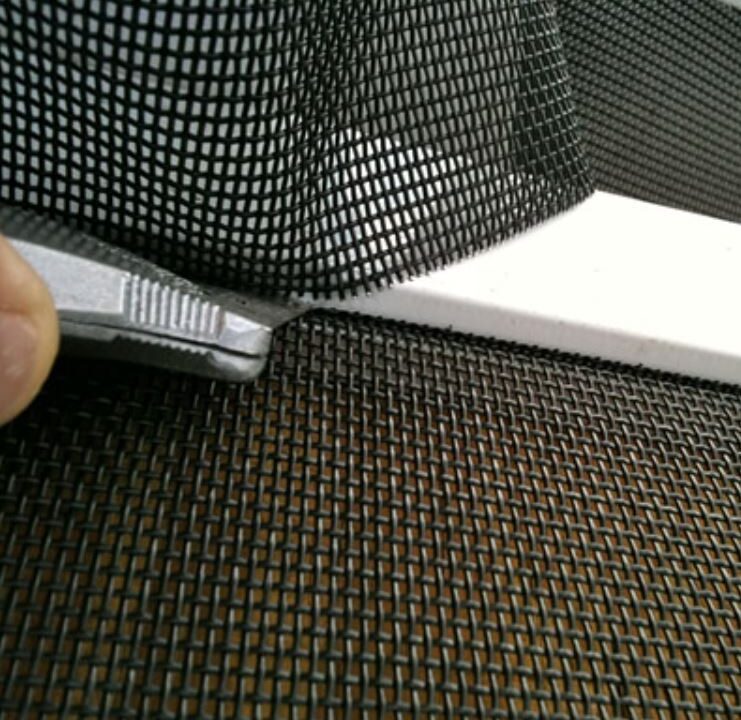 Fine window screen material trimmed for a tighter fit, replacement windows Santa Barbara, CA